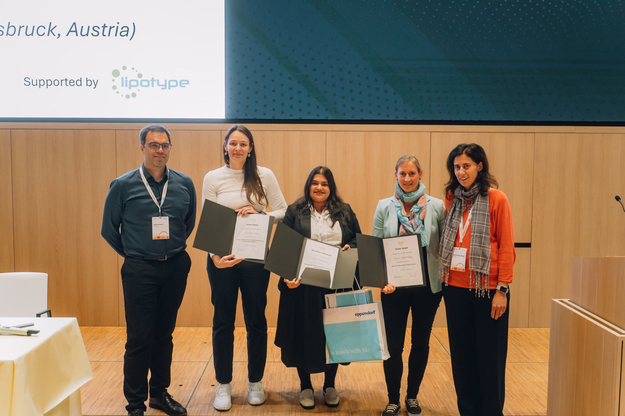 Award ceremony at the 65th ICBL in Innsbruck, Austria — winners receiving certificates on stage